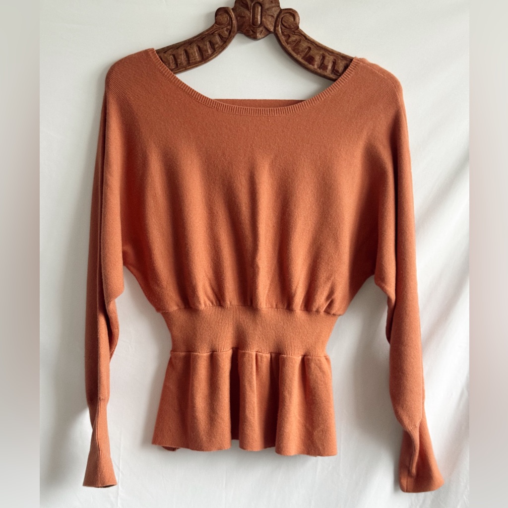 Rust Orange Peplum Sweater With Open Back